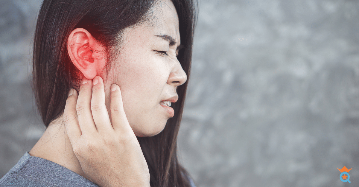 woman suffering ear pain, red ear