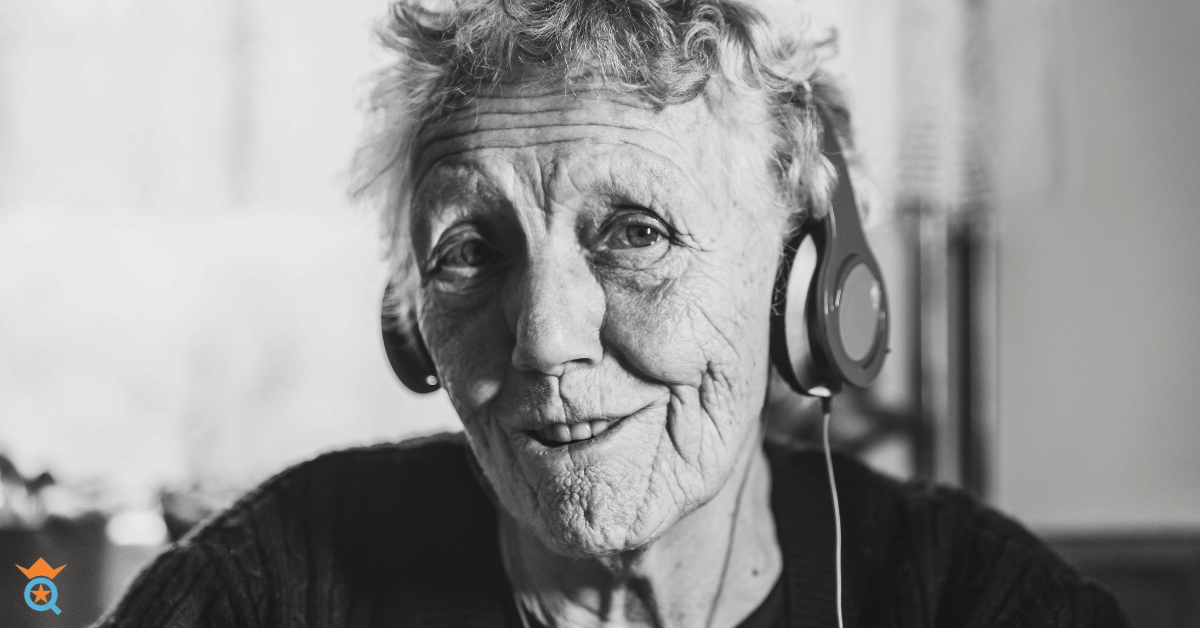 old woman wearing old headphones