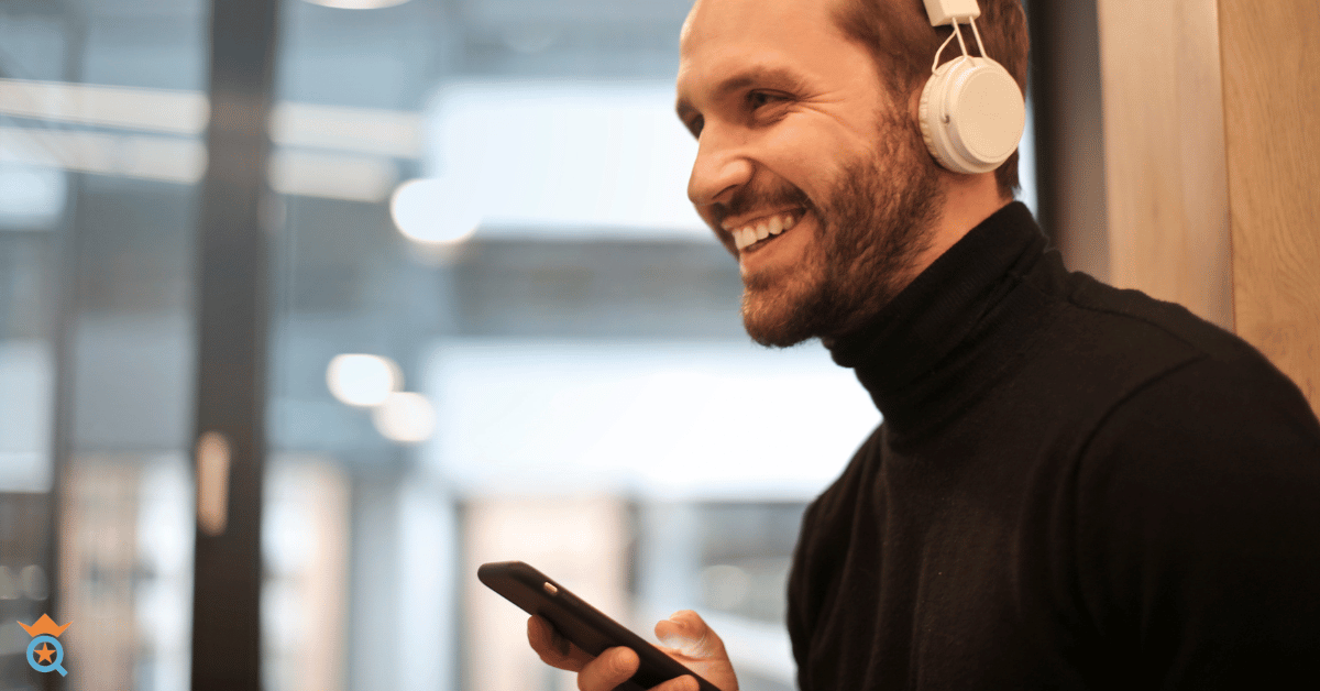 guy wearing headphone smiling