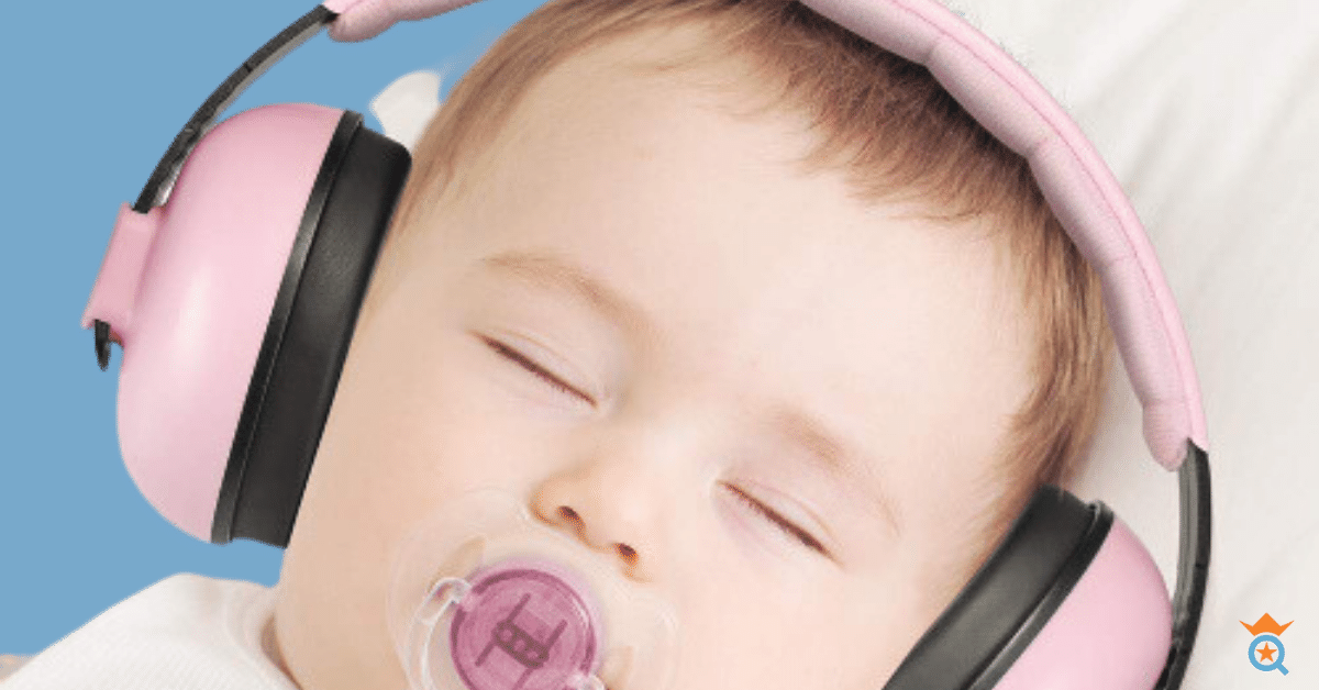 baby wearing noise cancelling headphone while sleeping